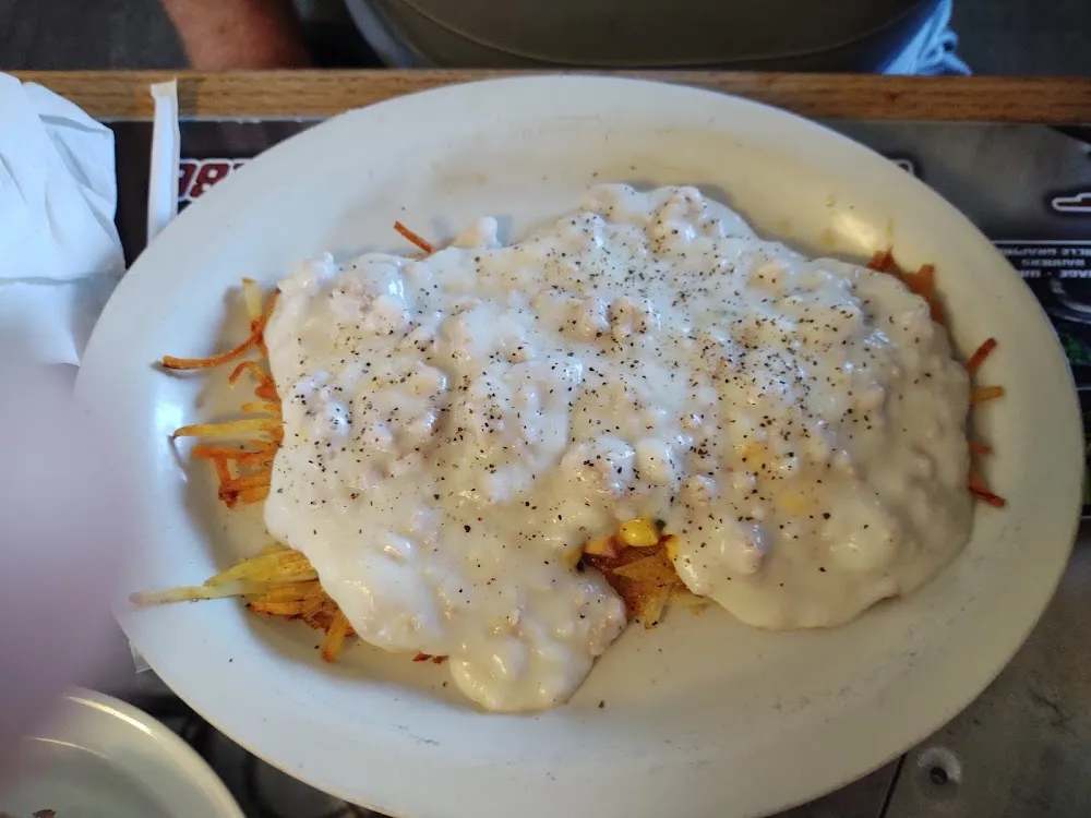 Topped with Sausage Gravy Tortilla Chips Meat Chees